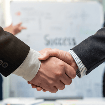 Becoming a Yoma Car Share Member A close-up picture of a businessman shaking hands on a business cooperation agreement. Concept of Cooperation business and success